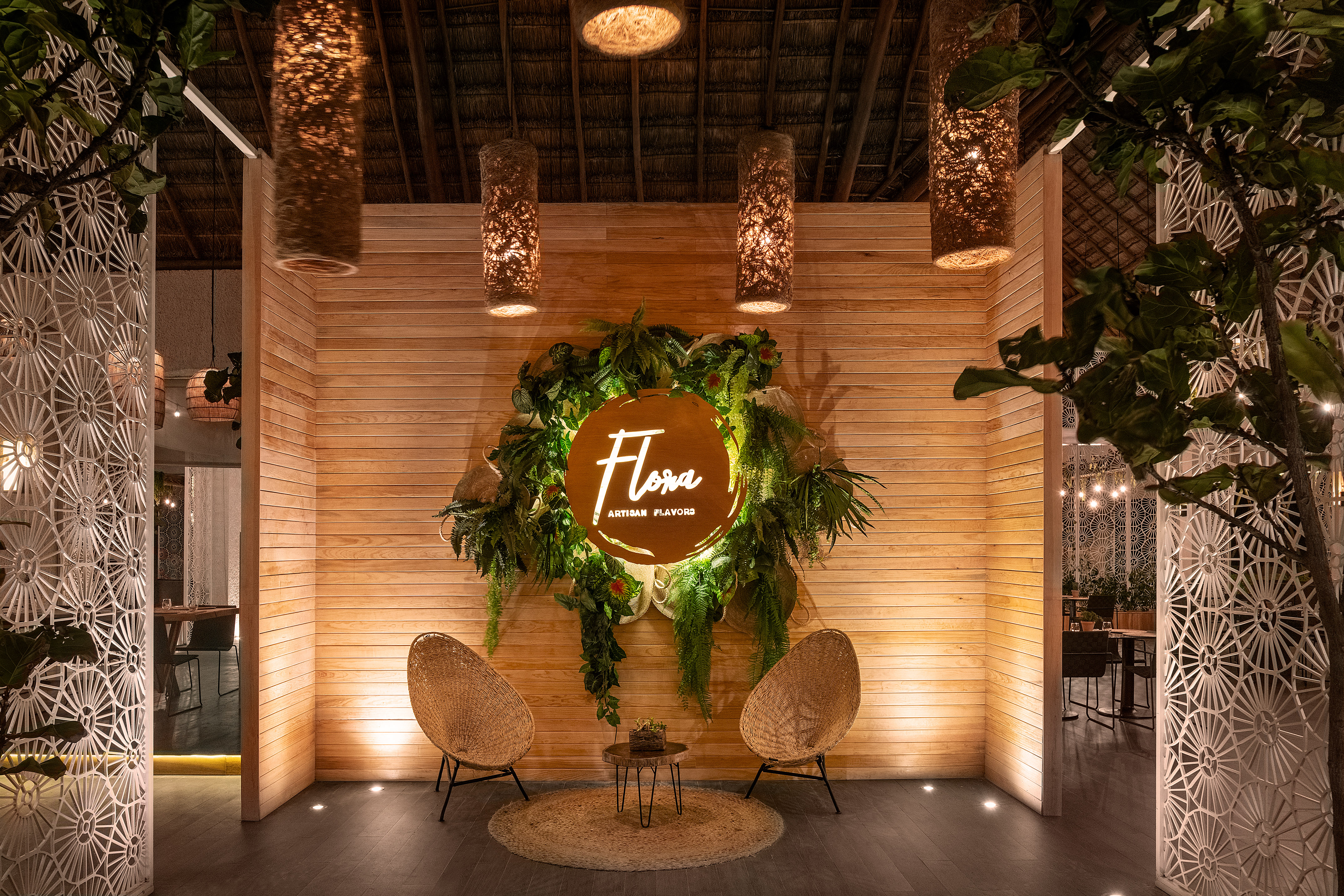 a room with a sign and chairs