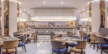 a restaurant with tables and chairs