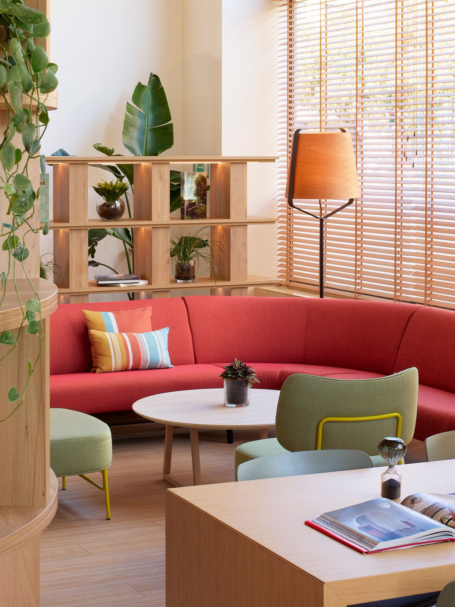 a room with a couch and tables