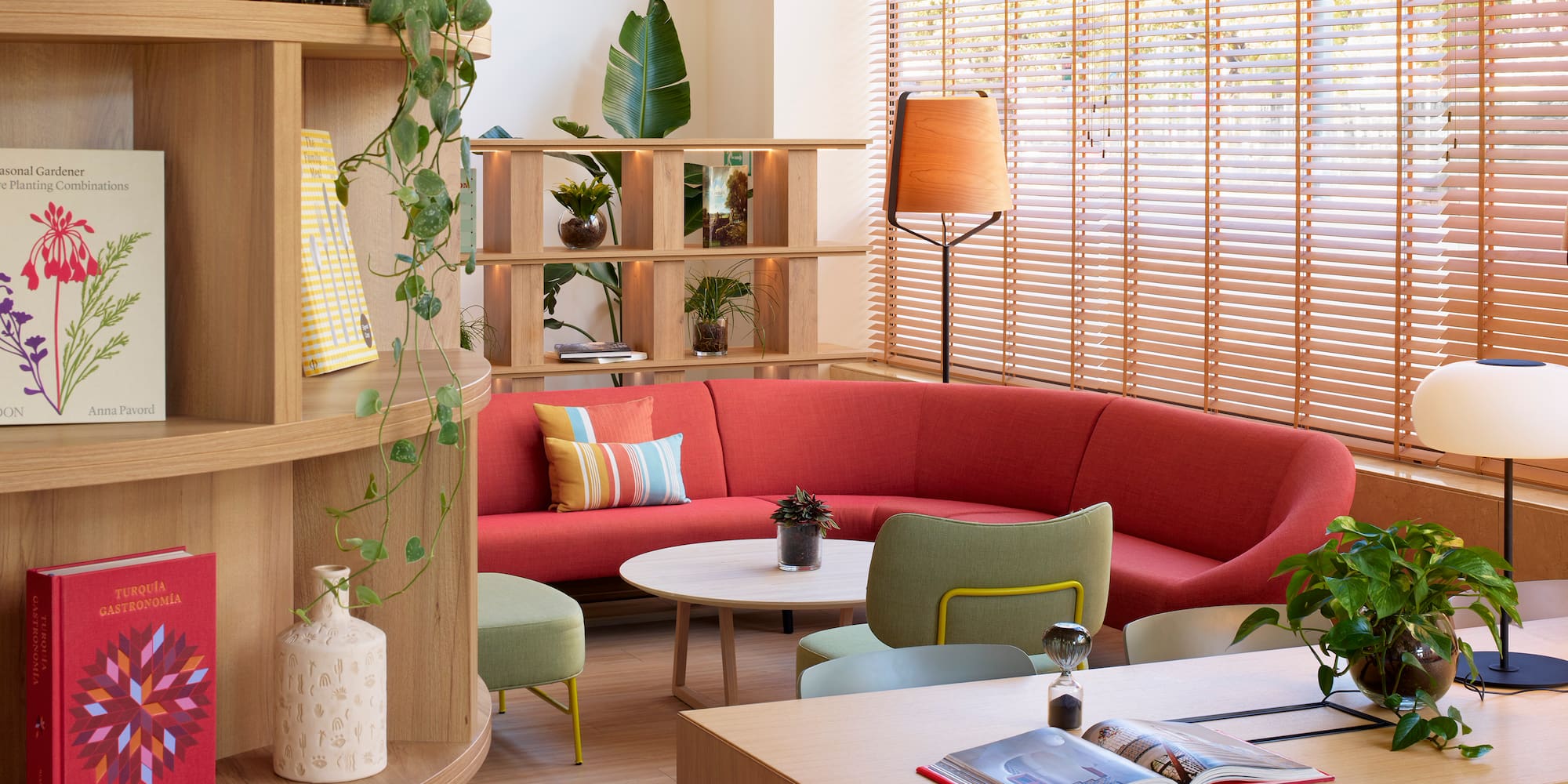 a room with a couch and tables