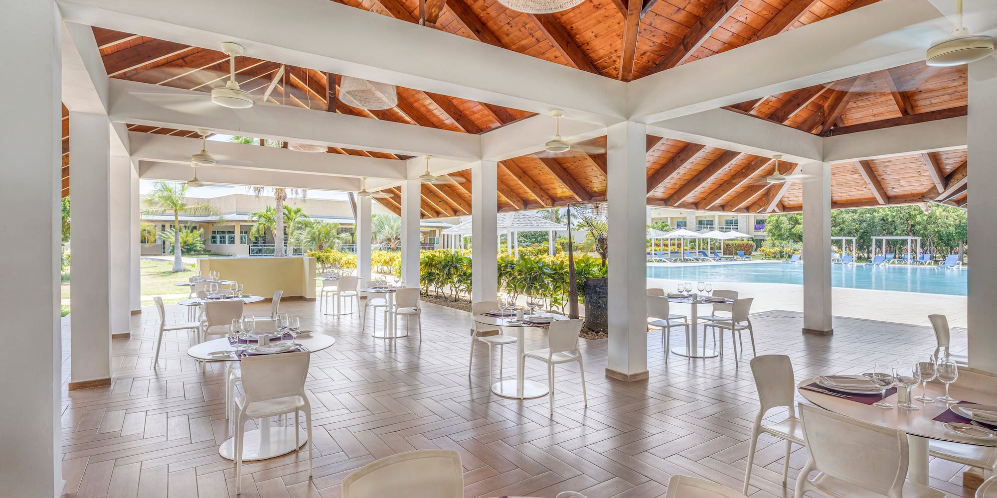 a room with tables and chairs