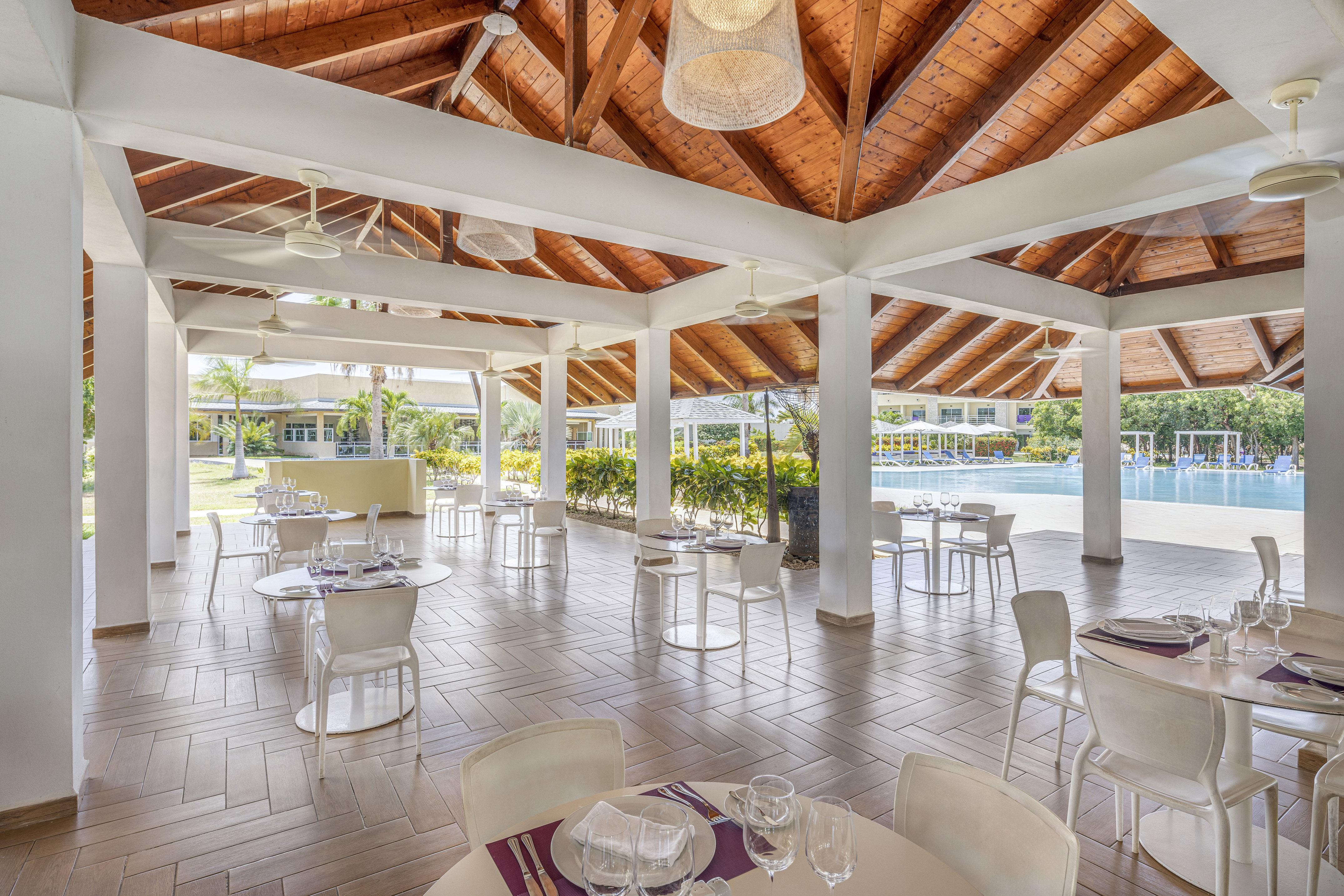 a room with tables and chairs