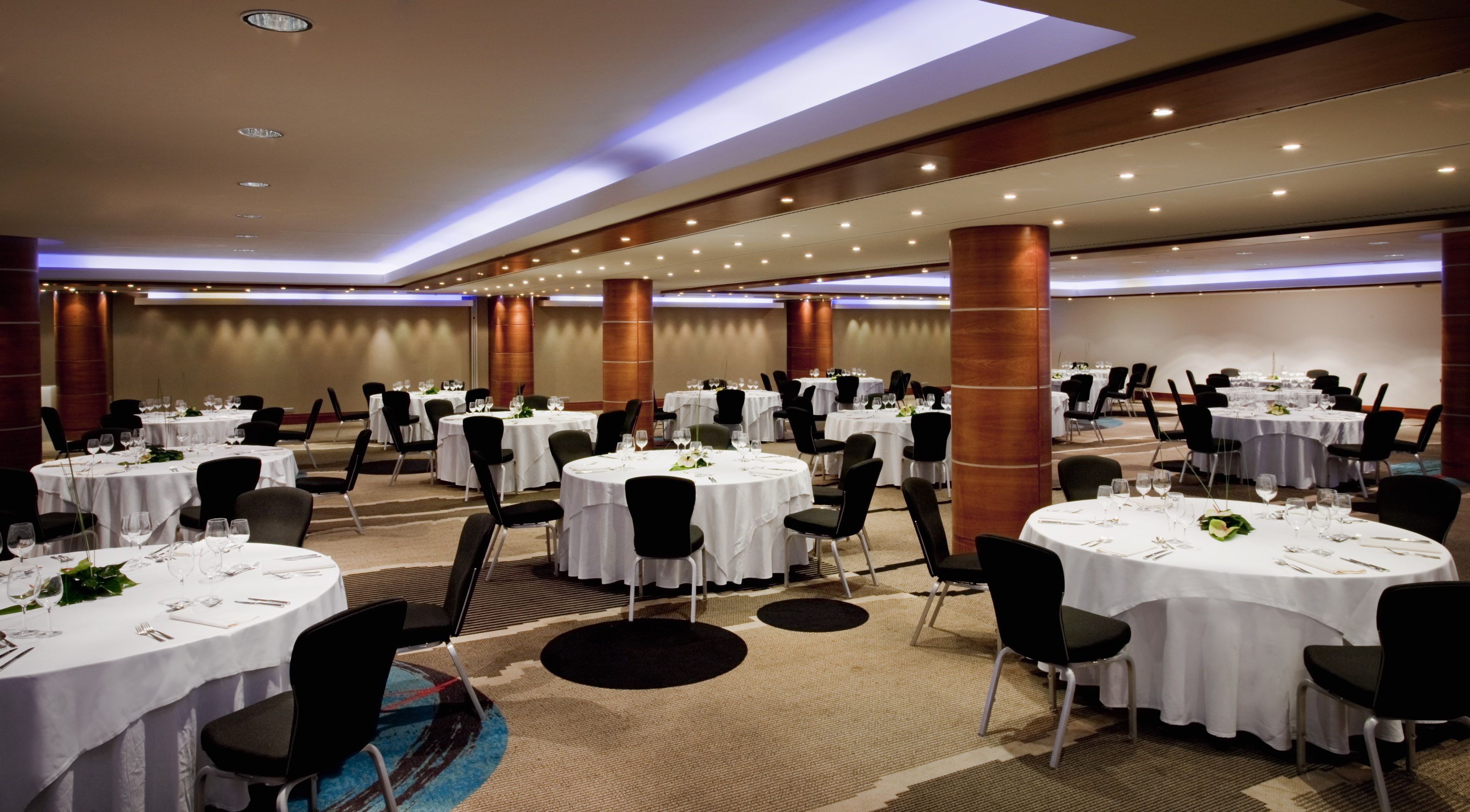 a room with tables and chairs