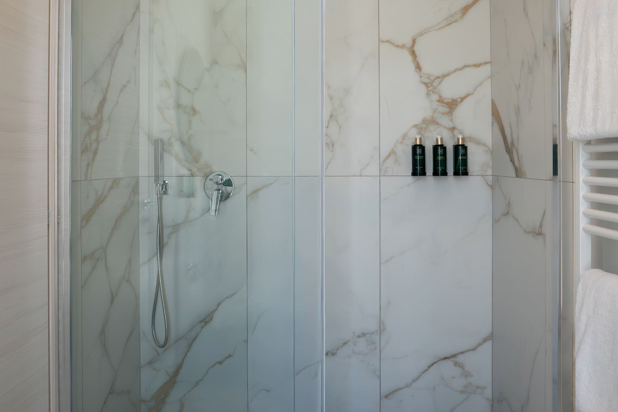 a shower with glass doors