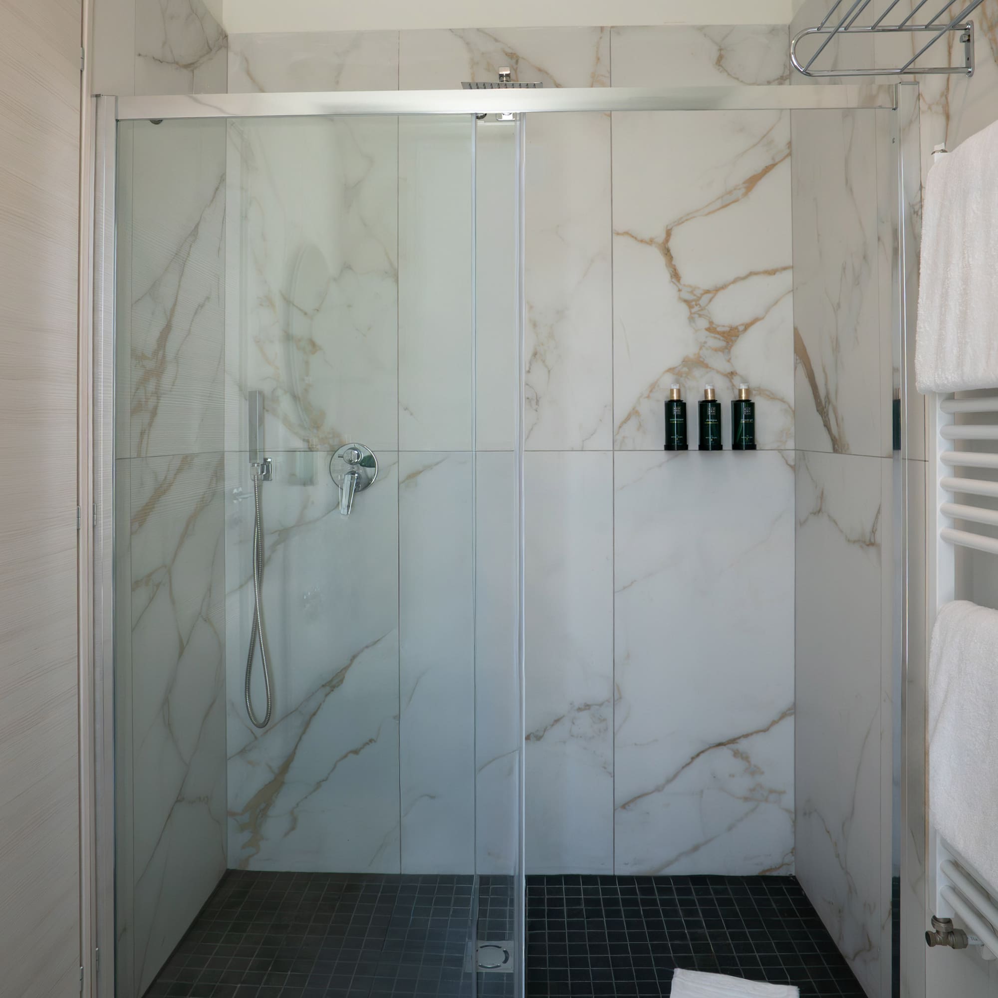 a shower with glass doors
