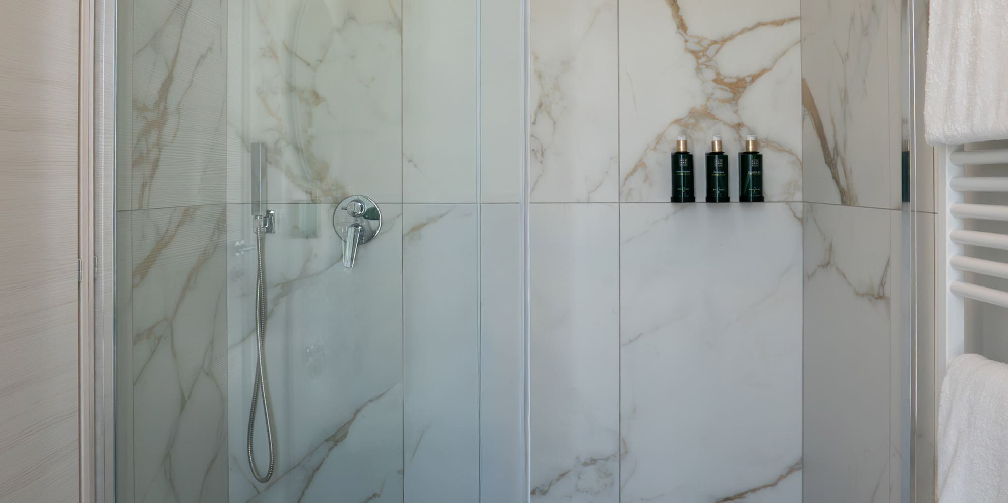 a shower with glass doors