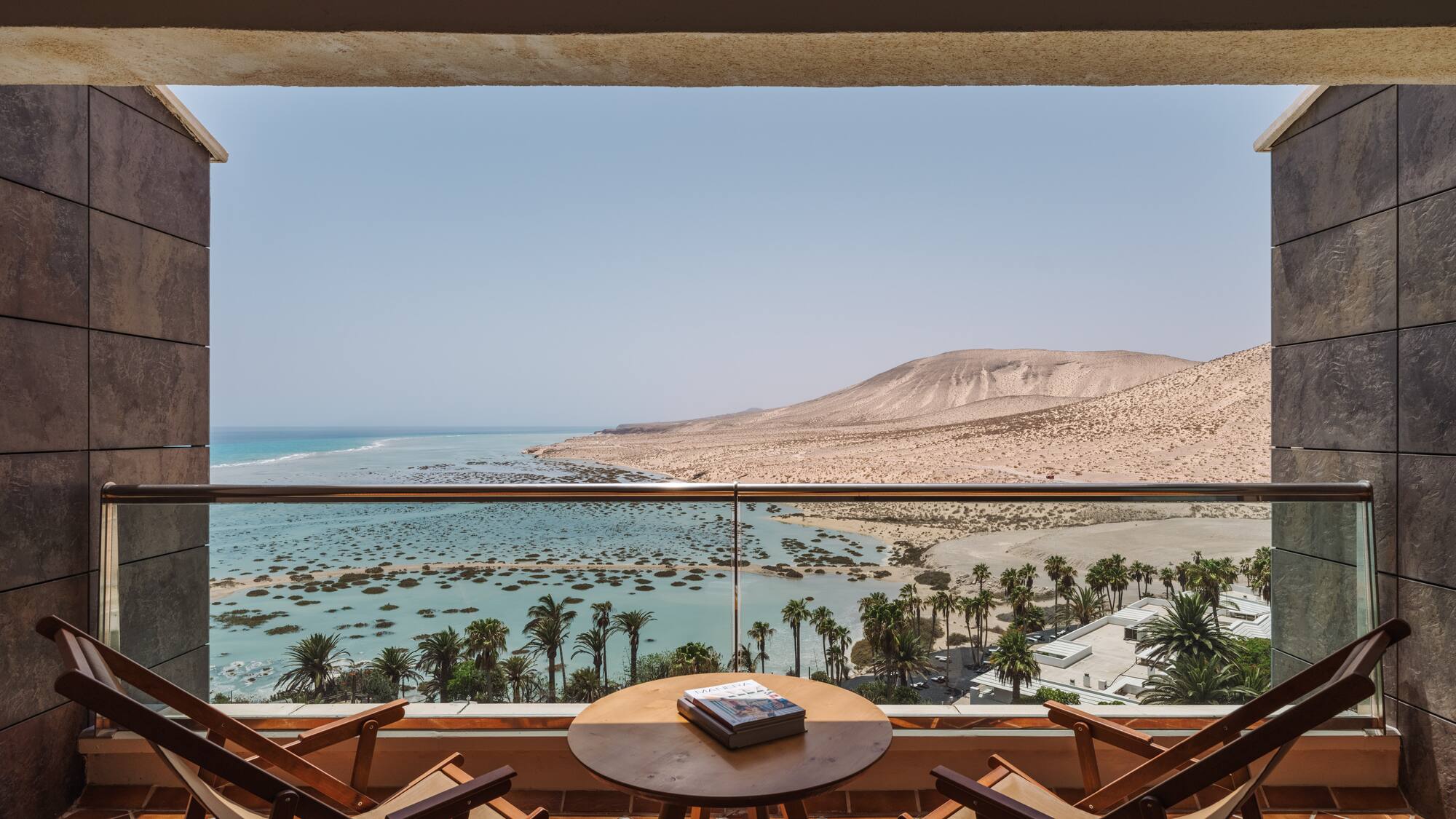 a view of the ocean from a balcony