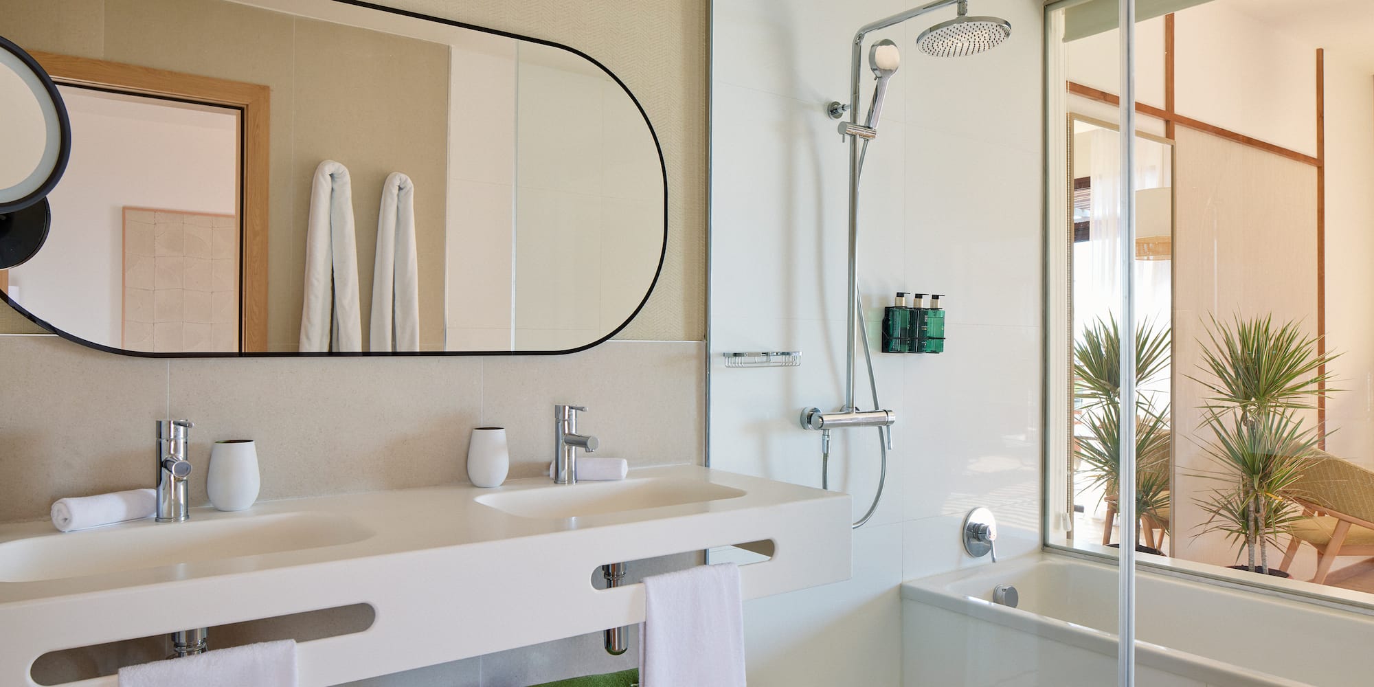 a bathroom with a shower and sink
