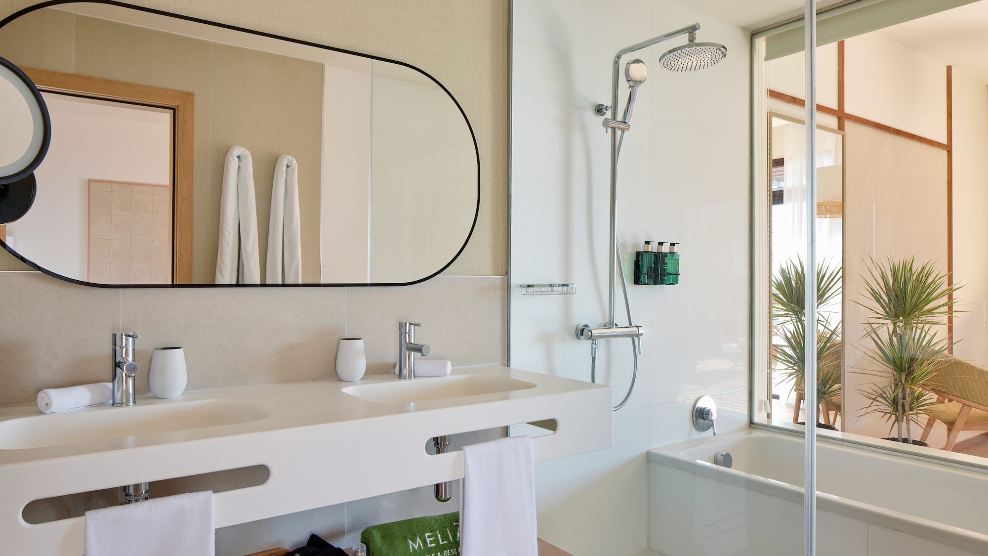a bathroom with a shower and sink