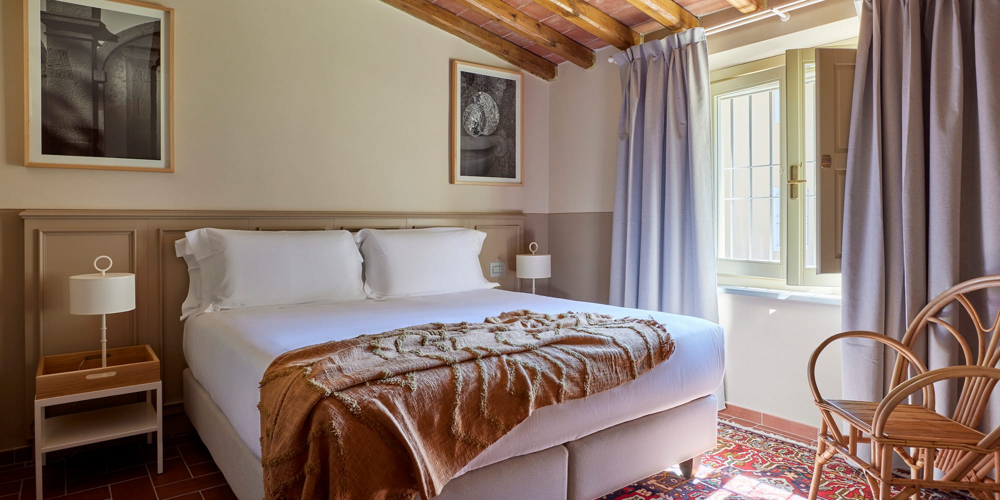 a bedroom with a bed and a chair