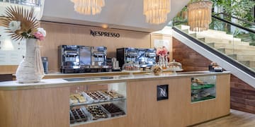 a counter with a variety of food items on it