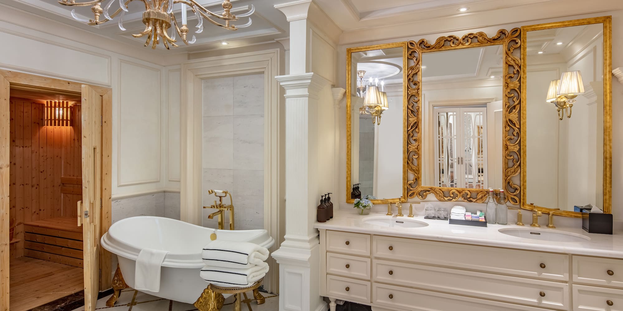 a bathroom with a large mirror and a tub