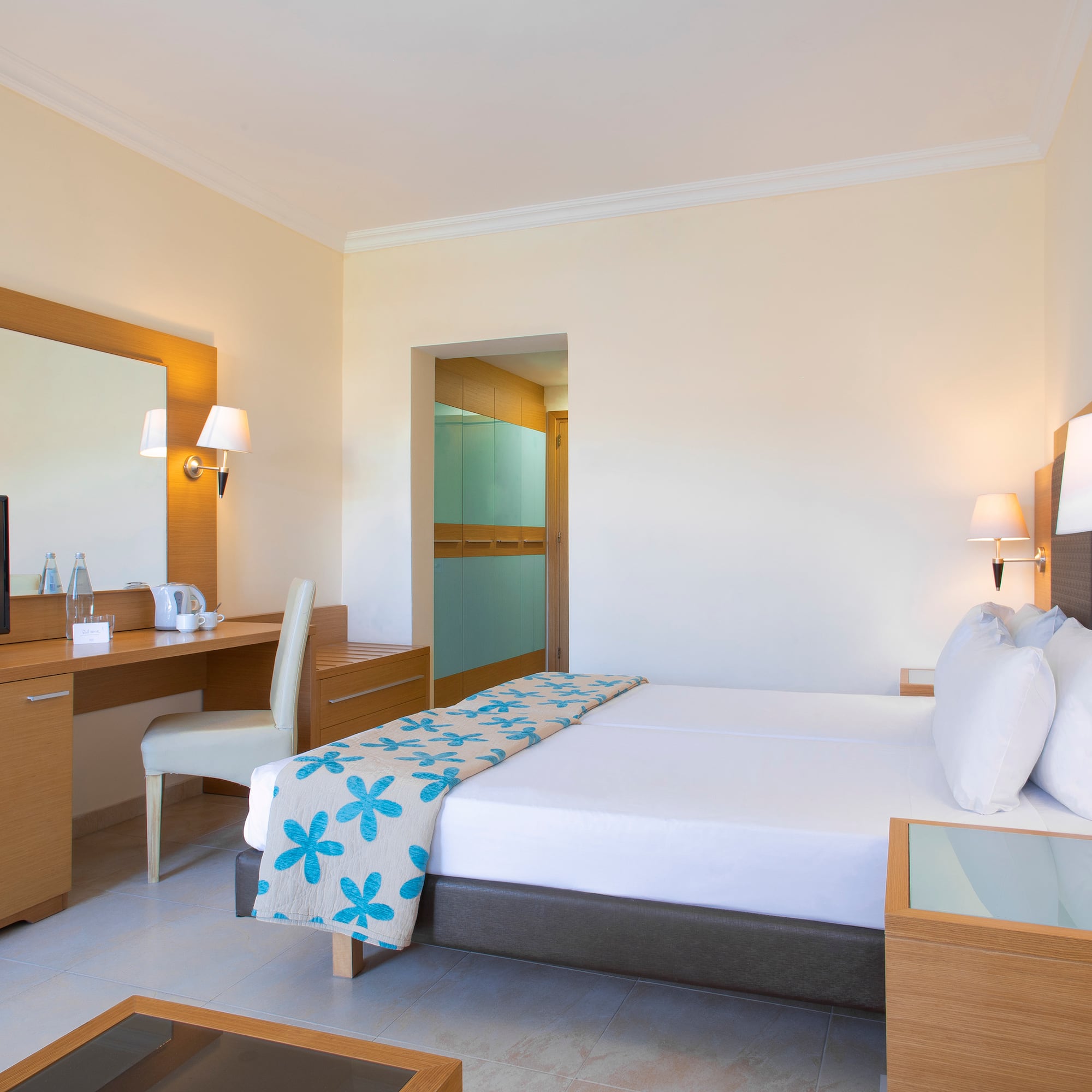 a room with a bed and a desk