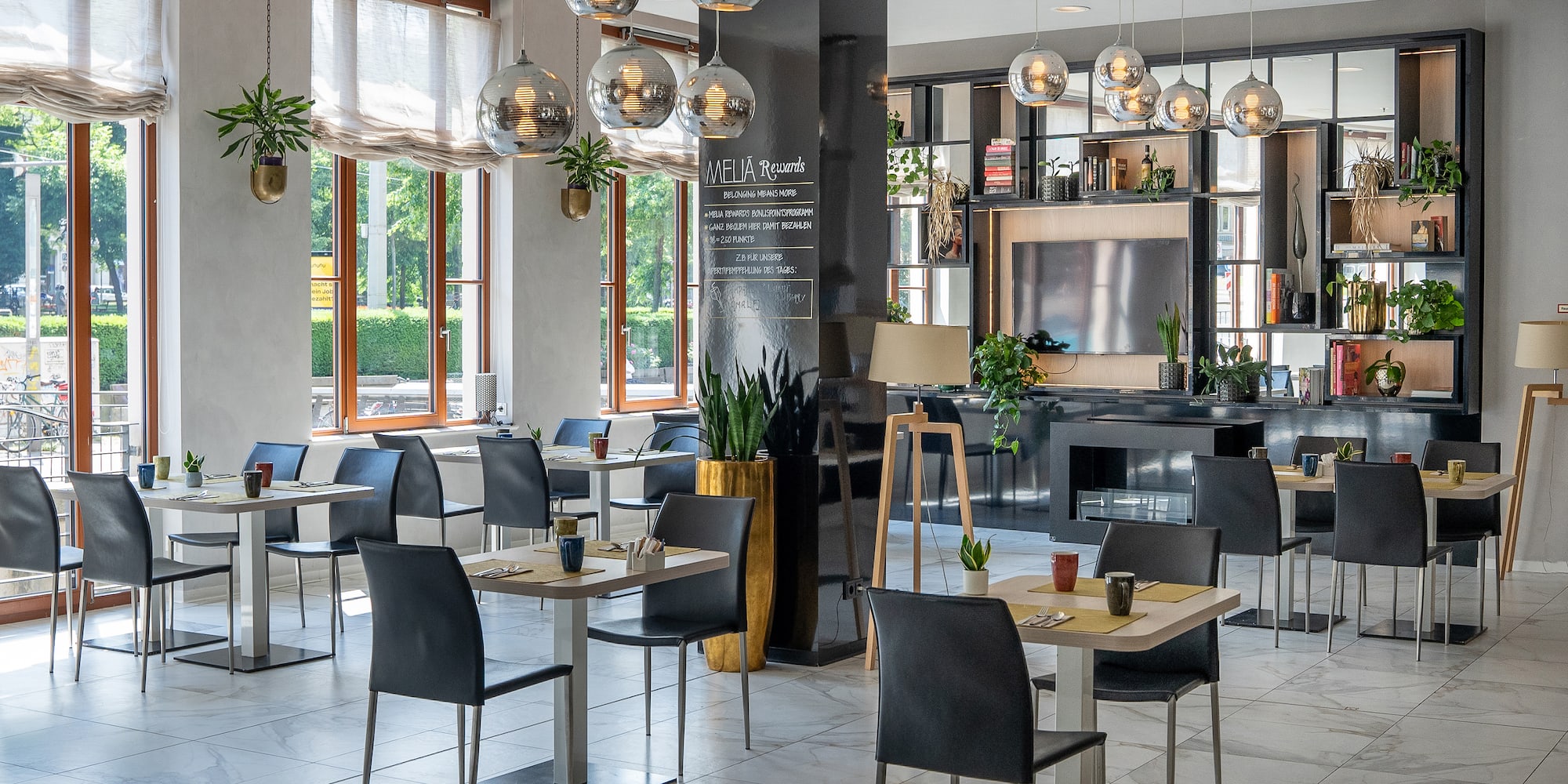 a room with tables and chairs