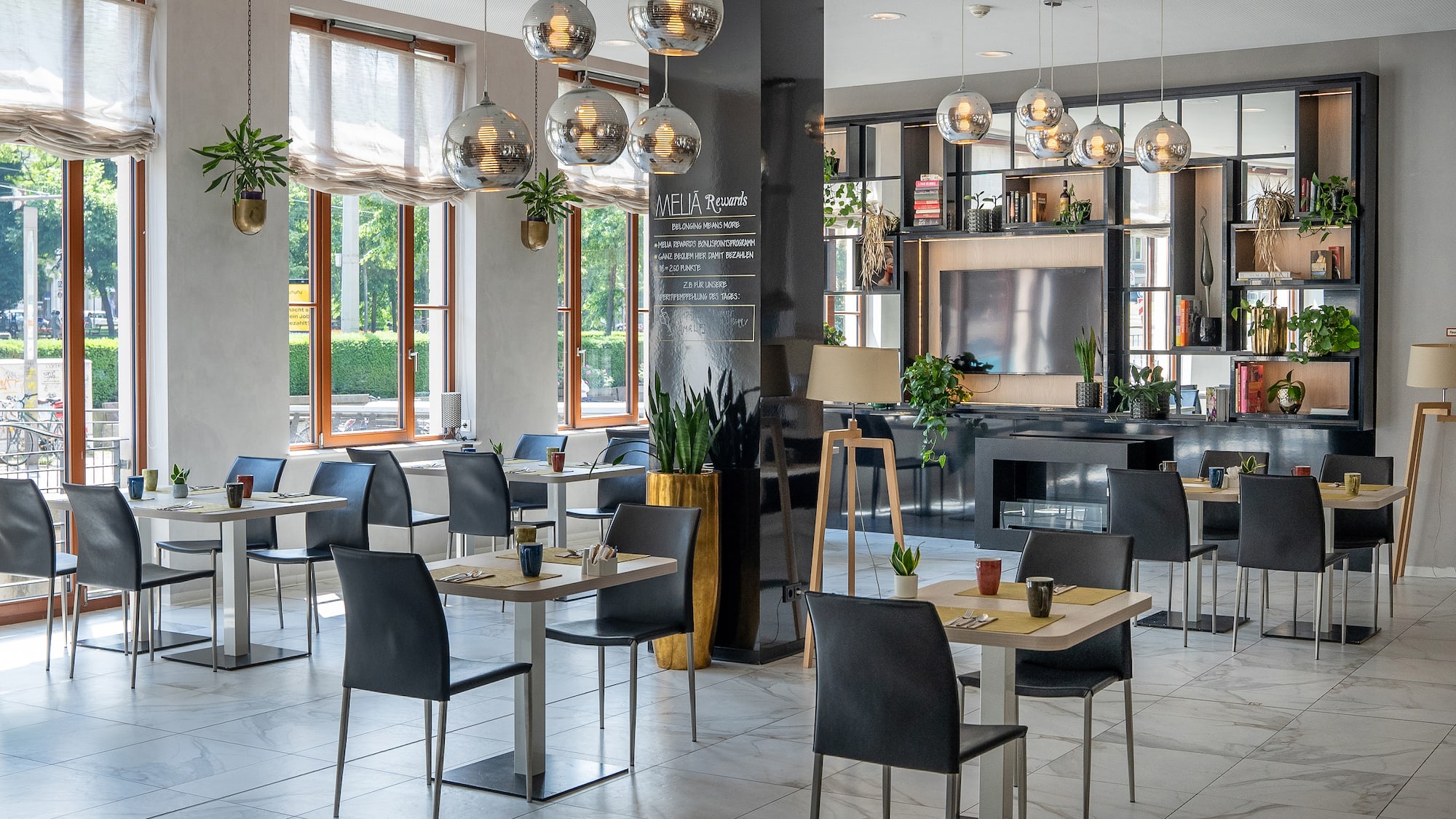 a room with tables and chairs