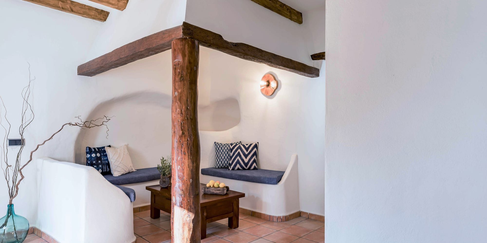 a room with a couch and a coffee table