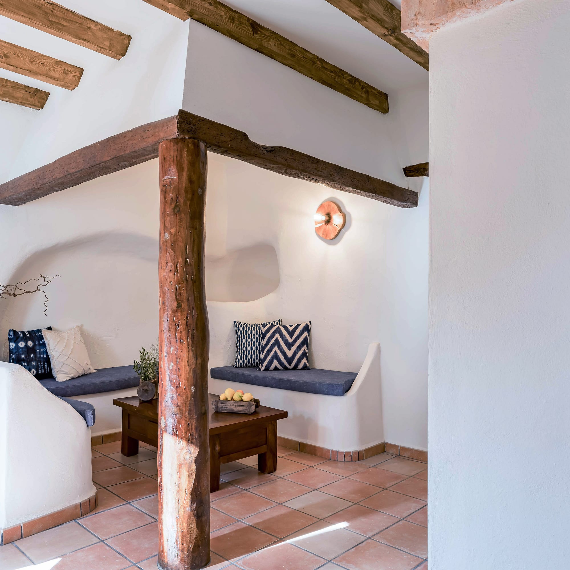 a room with a couch and a coffee table