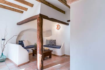 a room with a couch and a coffee table