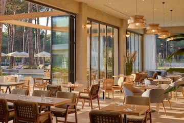 a room with tables and chairs