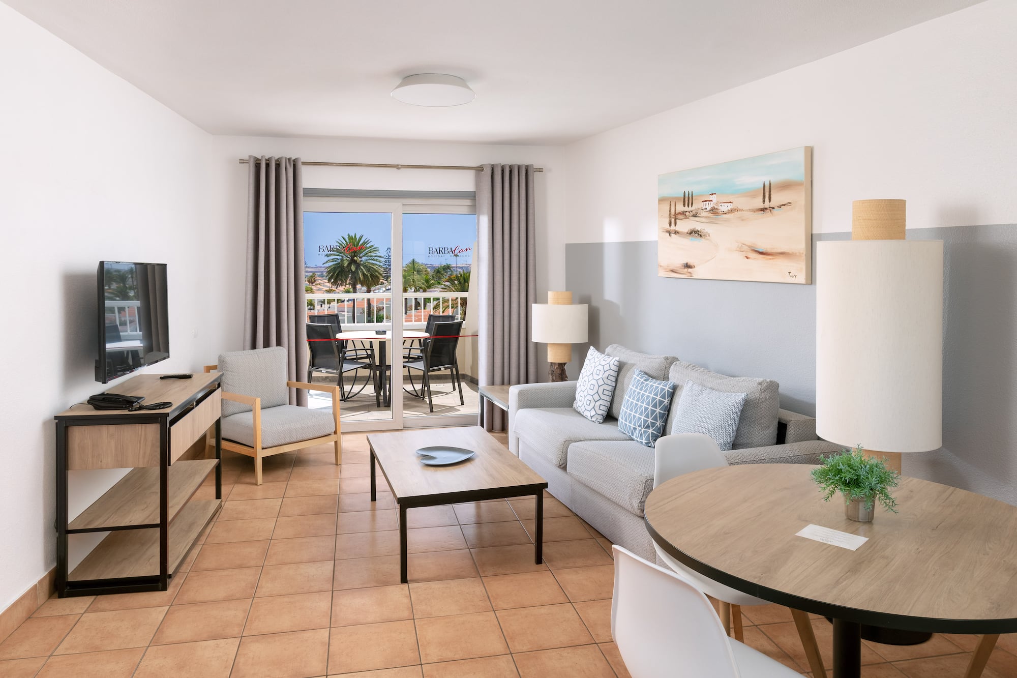 a living room with a couch and a table