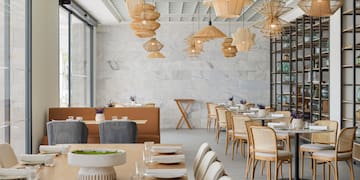 a room with tables and chairs