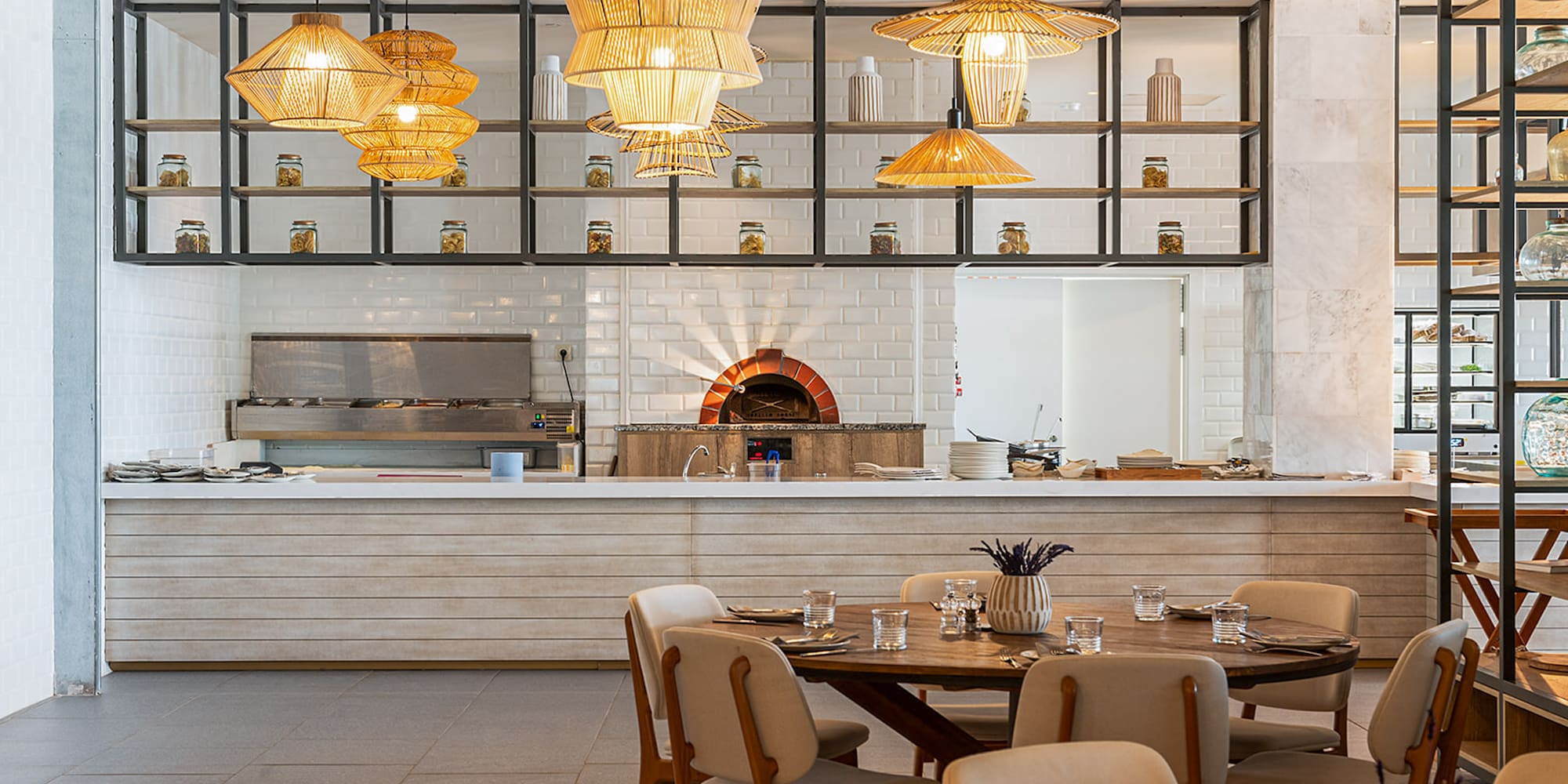 a restaurant with a large kitchen