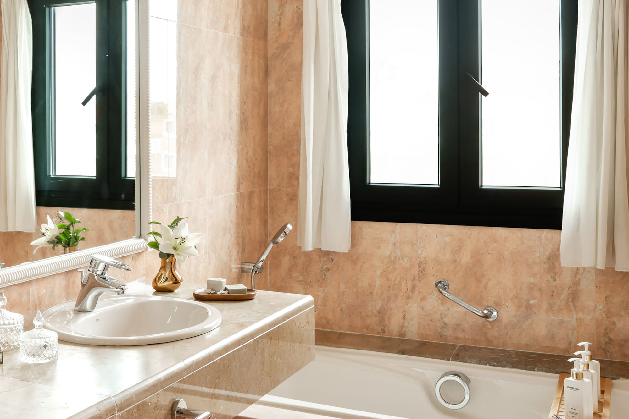a bathroom with a sink and tub