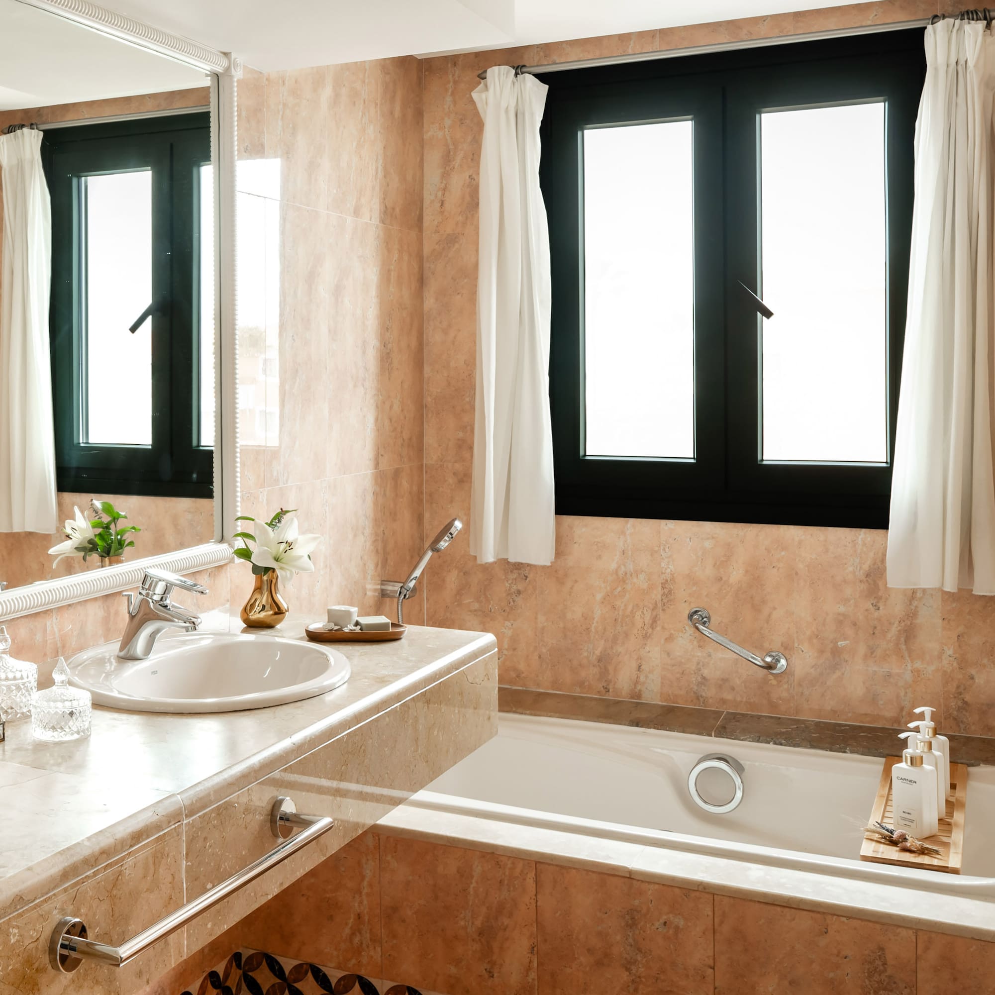 a bathroom with a sink and tub