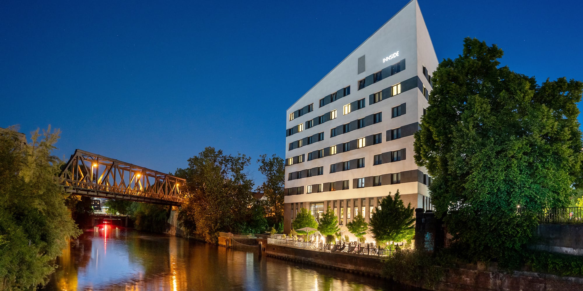a building next to a river