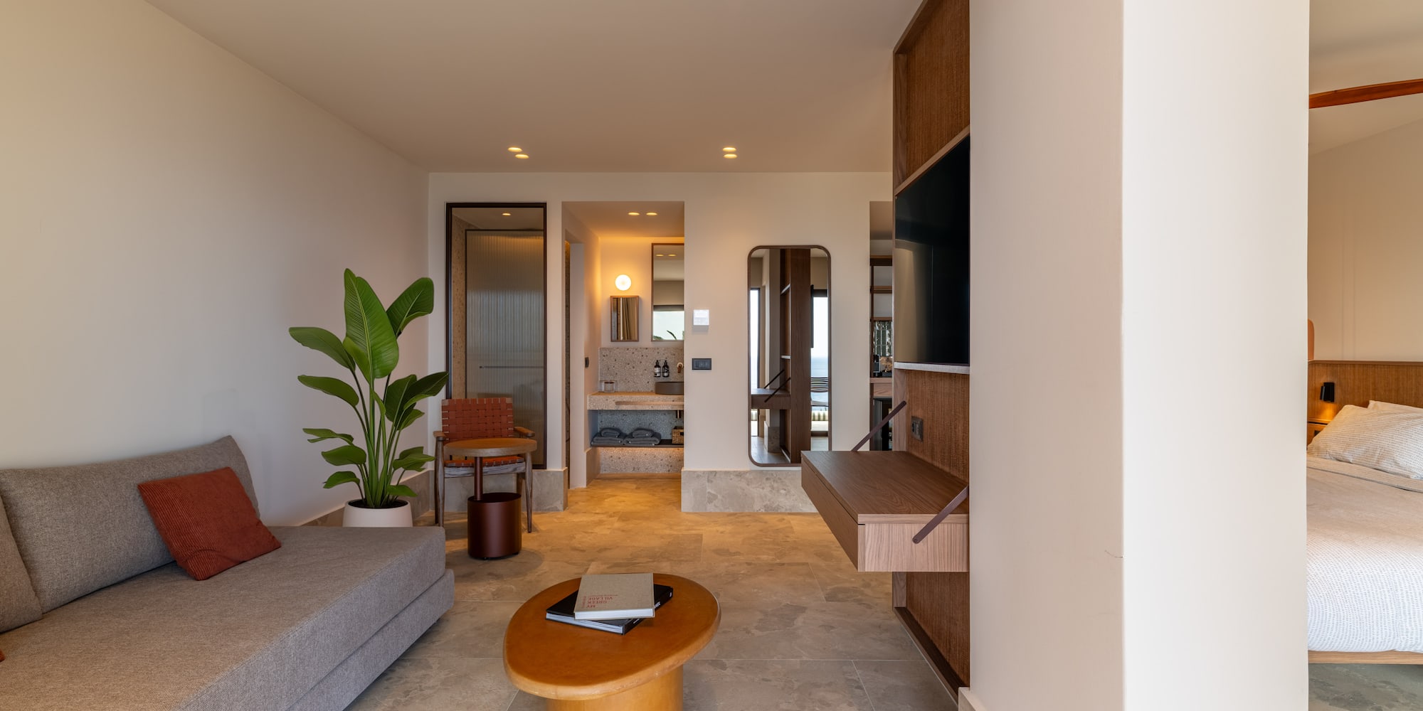 a living room with a couch and a table