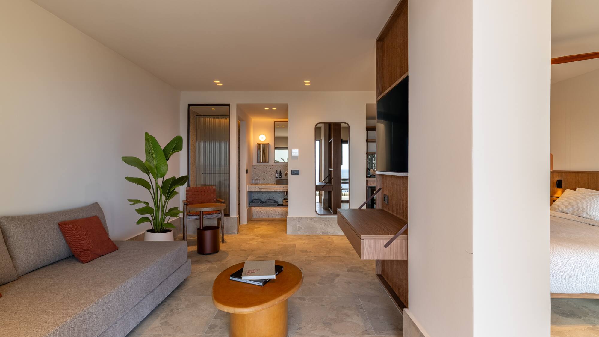 a living room with a couch and a table