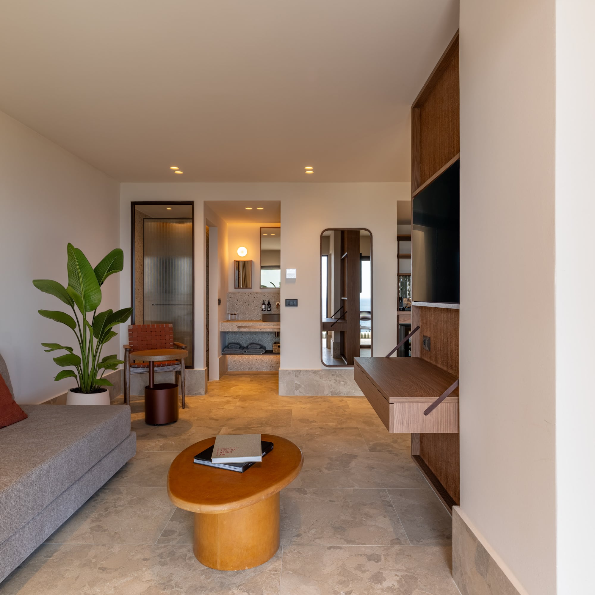 a living room with a couch and a table