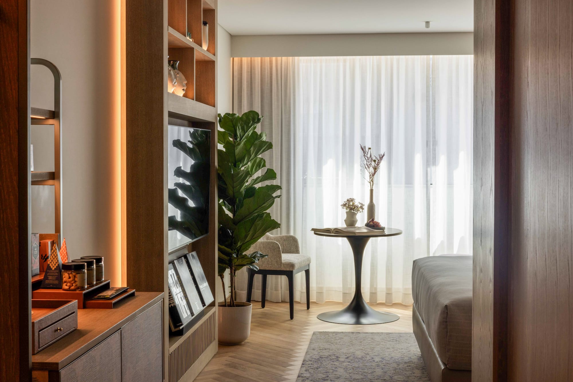 a room with a tv and a table