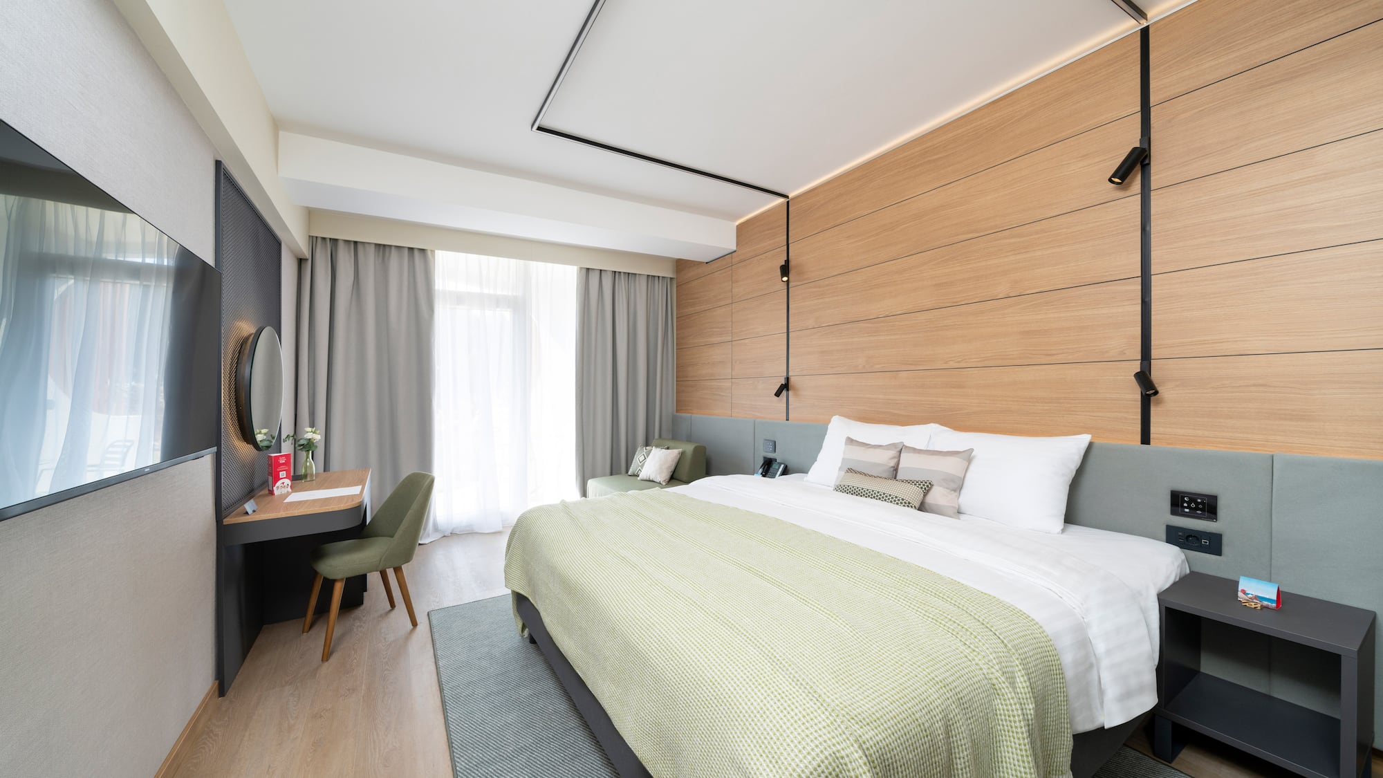 a room with a bed and a desk