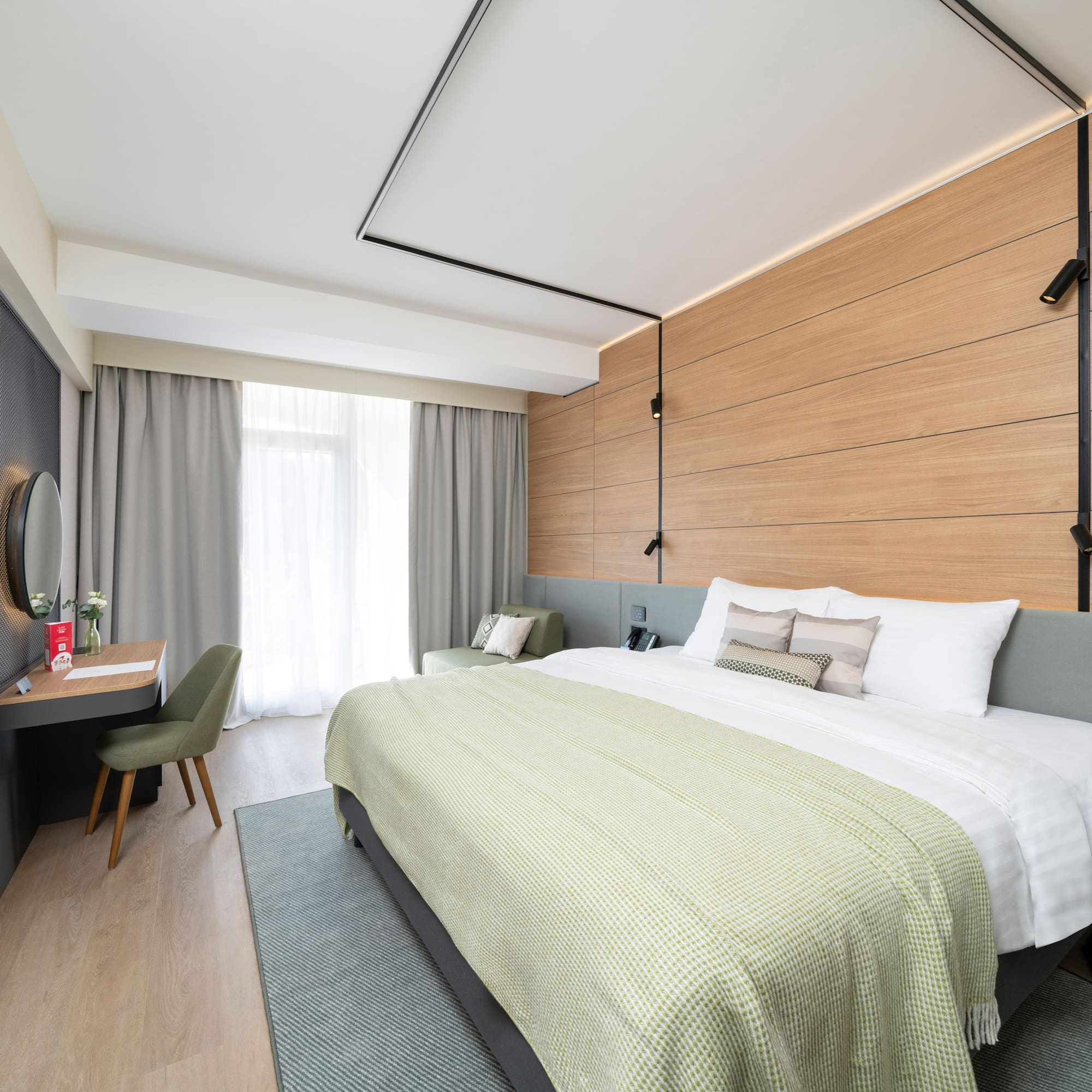 a room with a bed and a desk