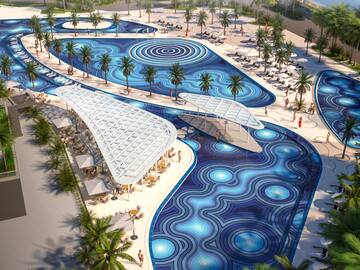 a pool with palm trees and people