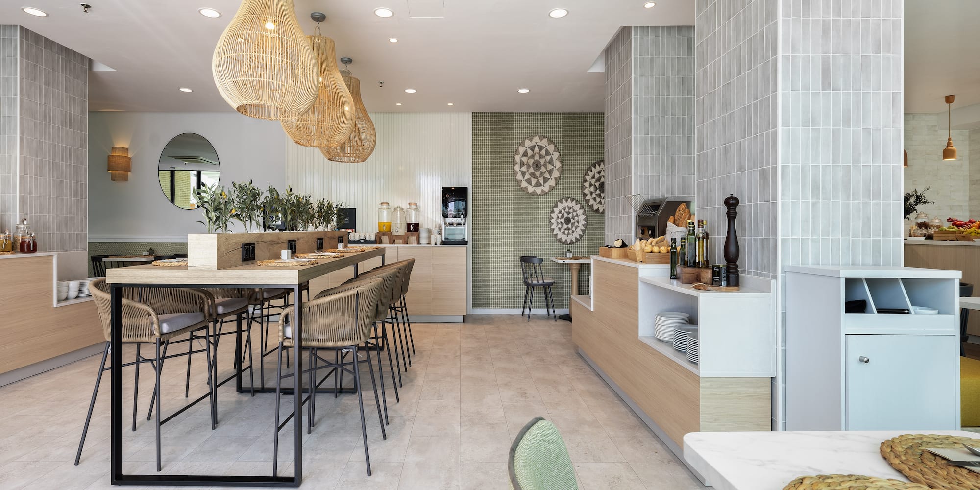 a restaurant with a bar and chairs