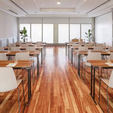 a room with tables and chairs