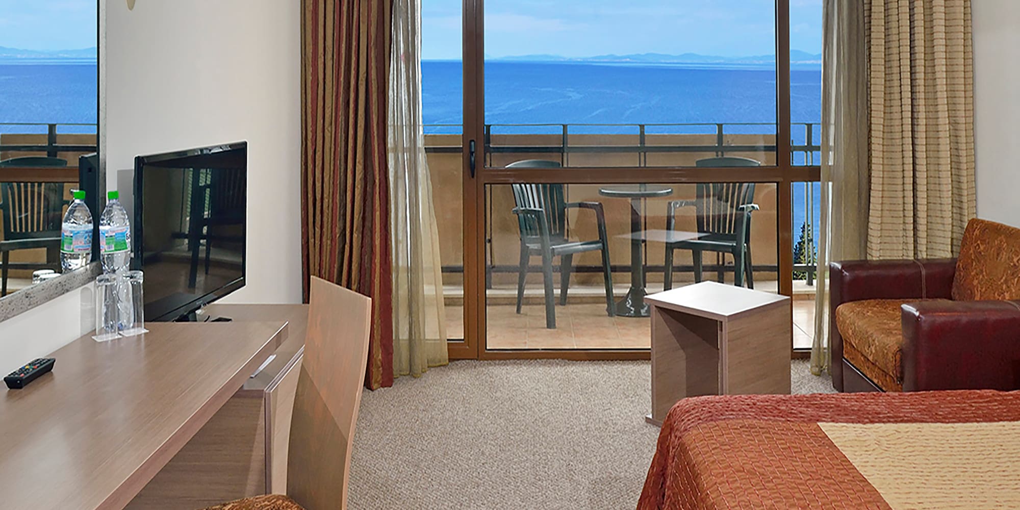 a room with a television and a table