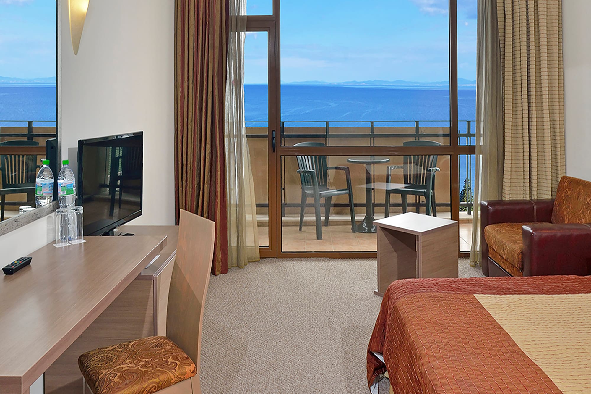 a room with a television and a table