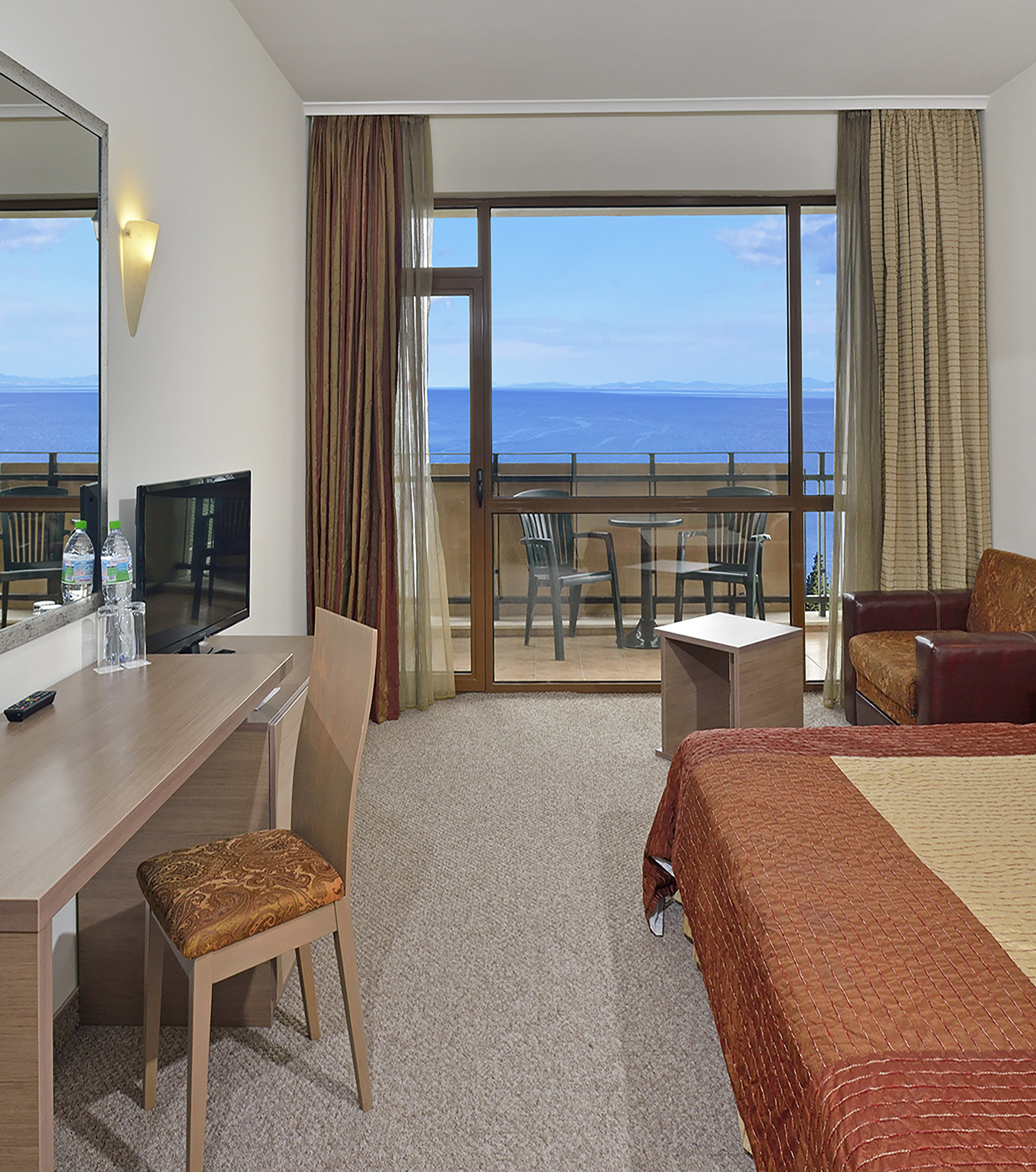 a room with a television and a table