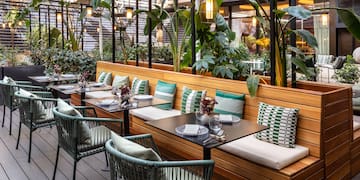 a table and chairs in a restaurant