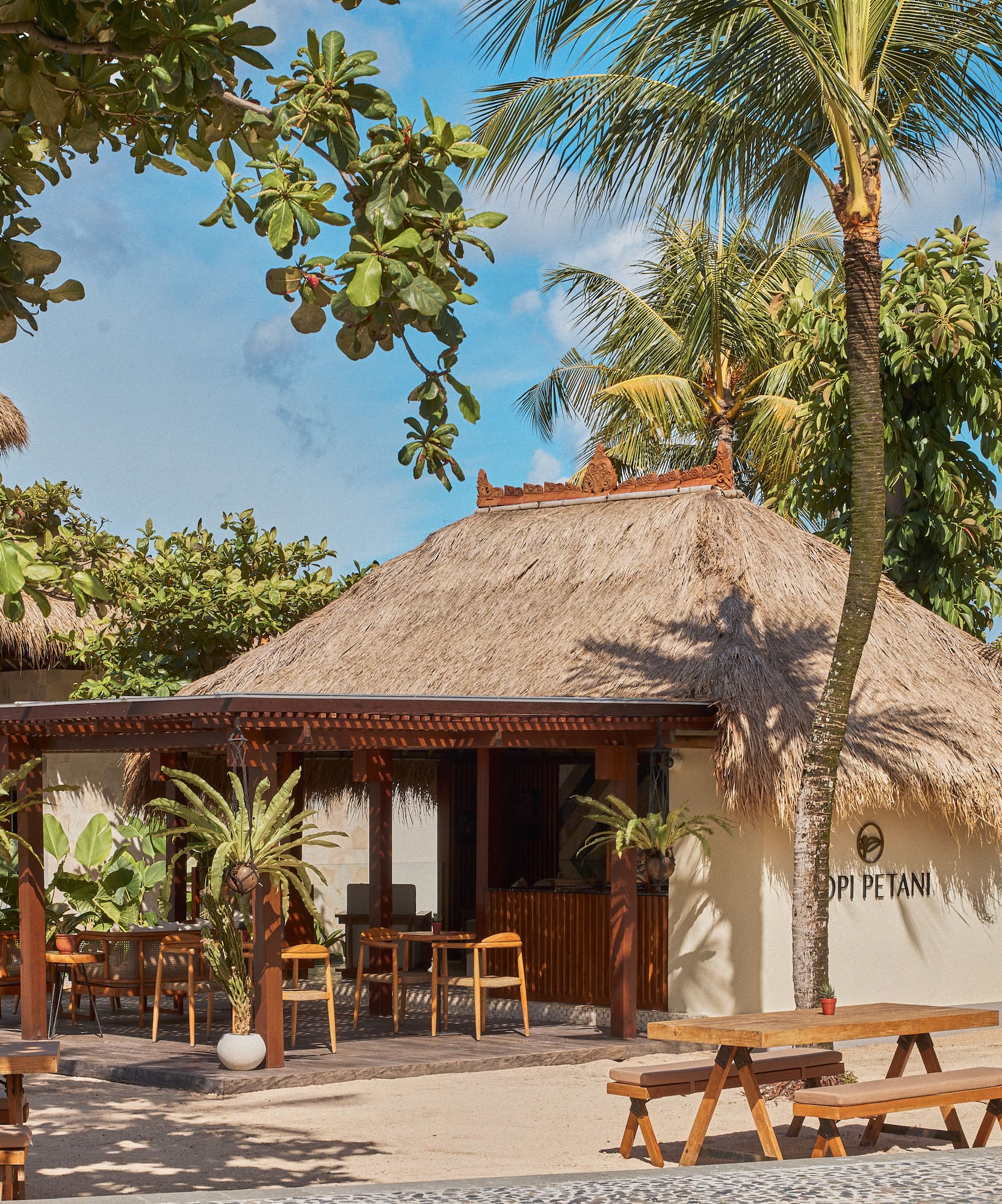 a building with tables and benches