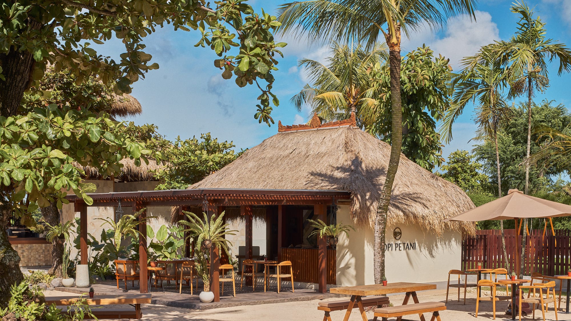 a building with tables and benches