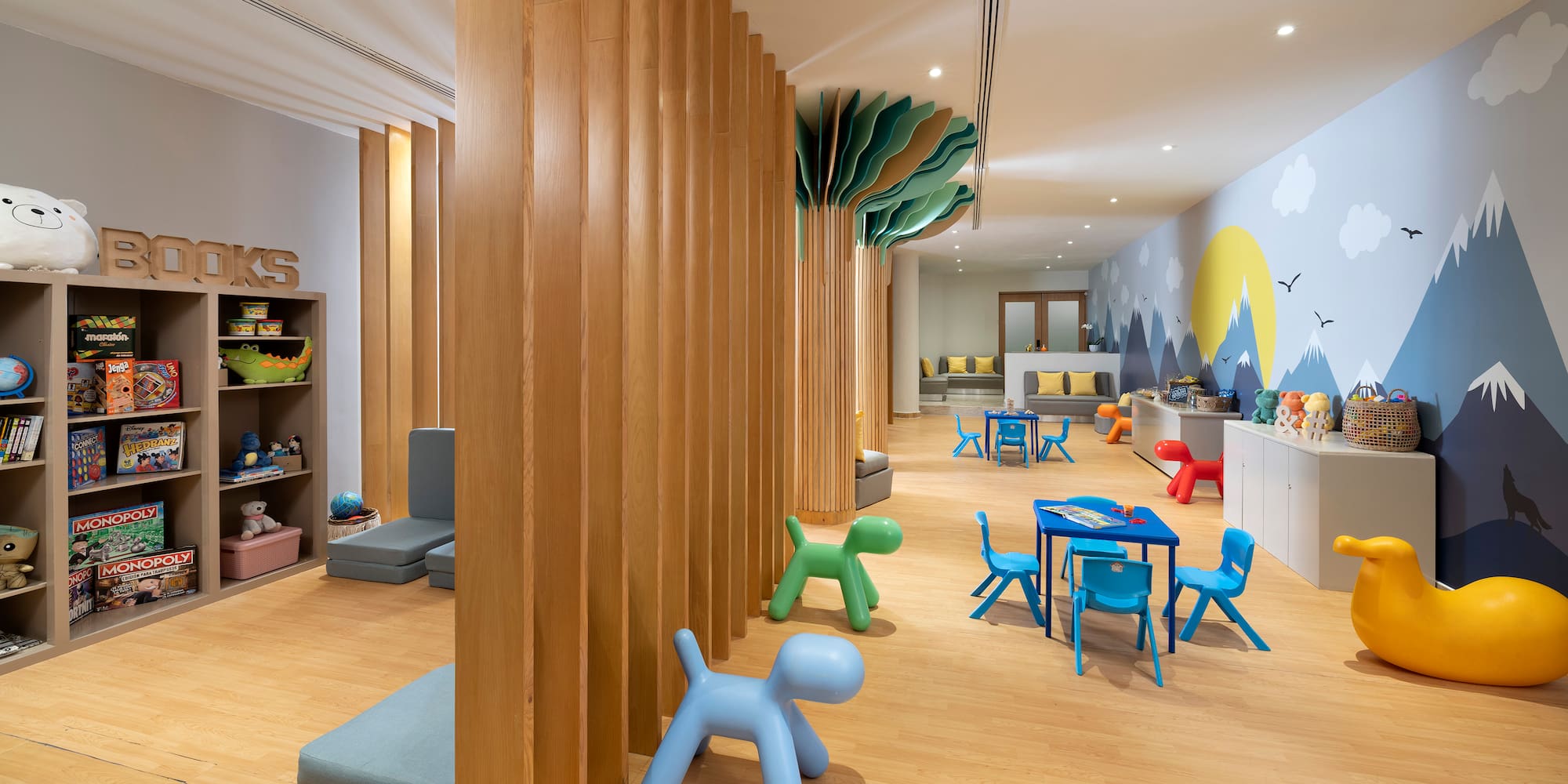 a room with wooden columns and toys