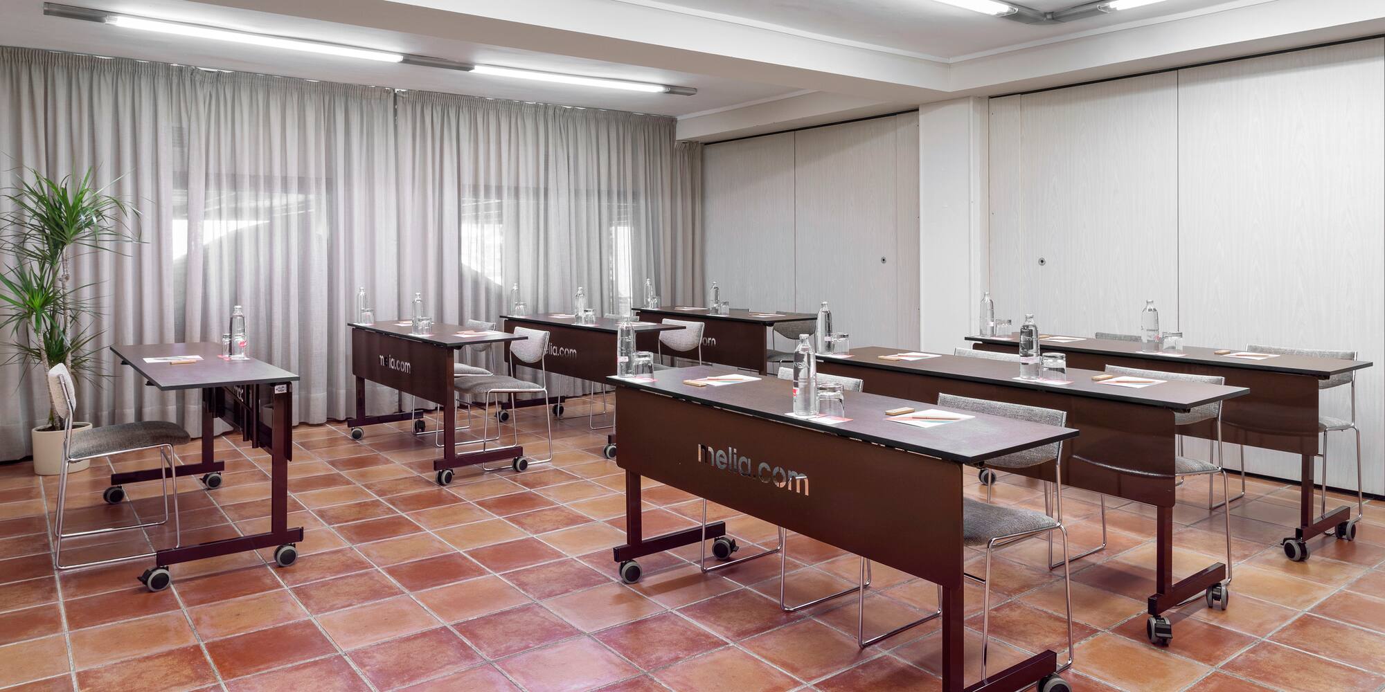 a room with tables and chairs