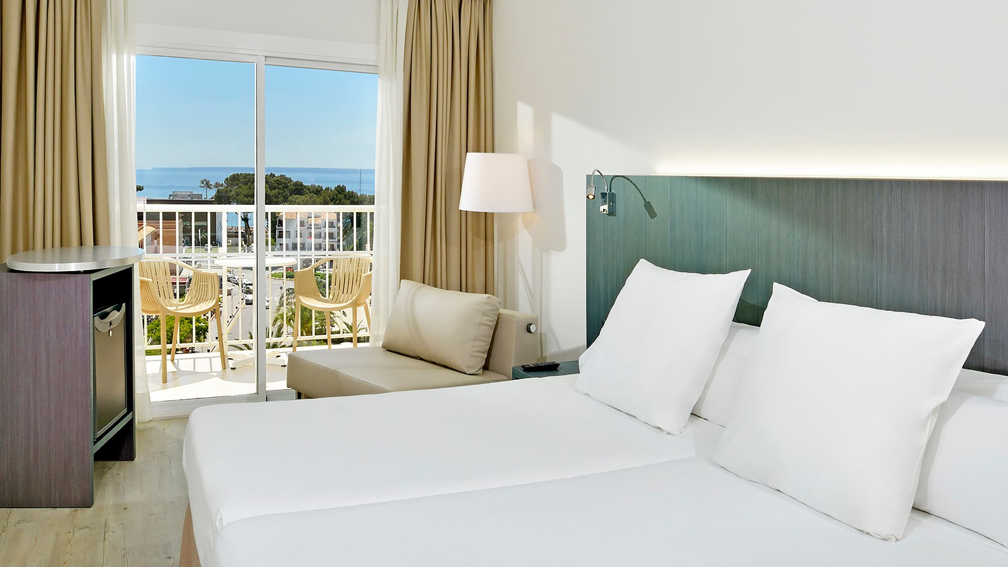 a room with a bed and a balcony