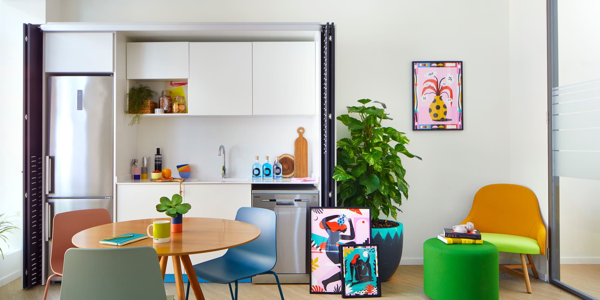 a room with a table and chairs