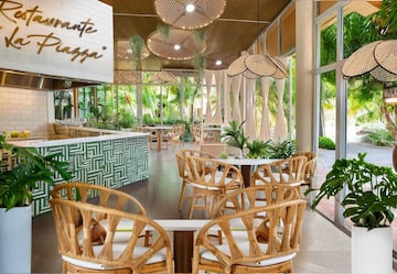 a restaurant with tables and chairs