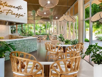 a restaurant with tables and chairs
